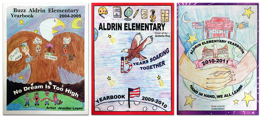 Composite photograph of three Aldrin Elementary School yearbook covers. On the left is the cover of the 2004 to 2005 yearbook. The cover of the 2009 to 2010 yearbook is in the center. The cover of the 2010 to 2011 yearbook is on the far right. All three feature student-drawn artwork with depictions of an eagle, the school mascot. Left to right, the yearbook themes are No Dream Is Too High, 15 Years Soaring Together, and Hand in Hand, We All Learn. 