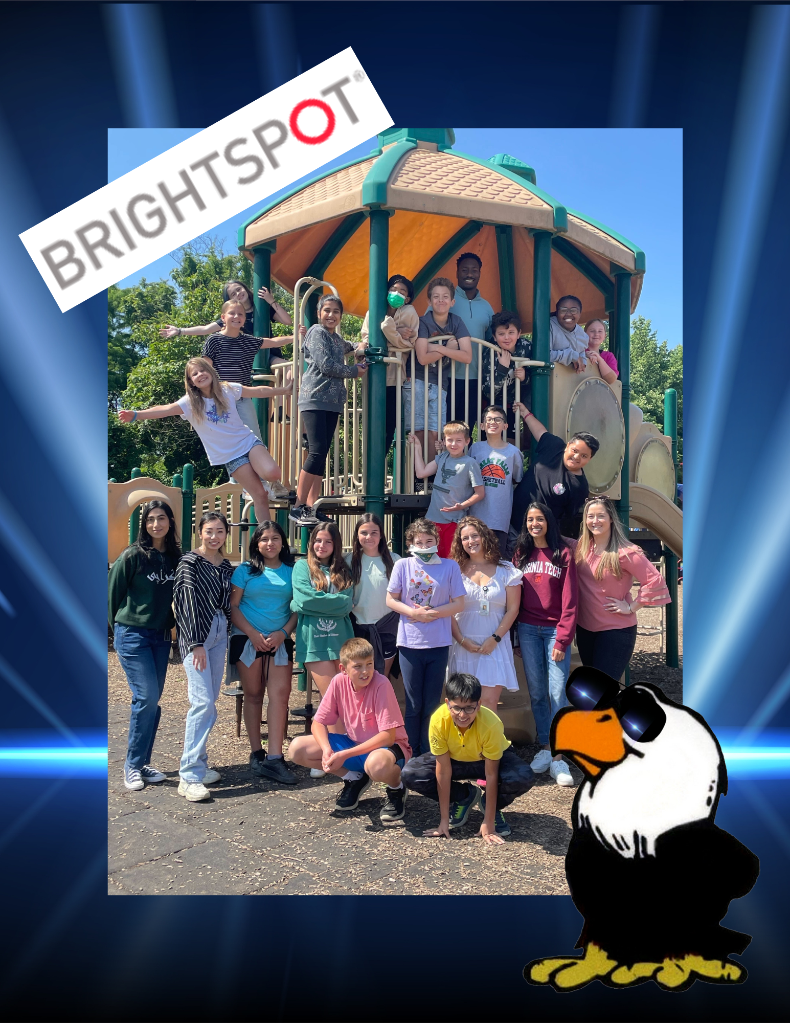 group photo of Brightspot mentors and students on the playground