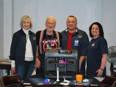 administration with buzz aldrin behind our 3D printer