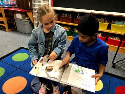 image of students reading together